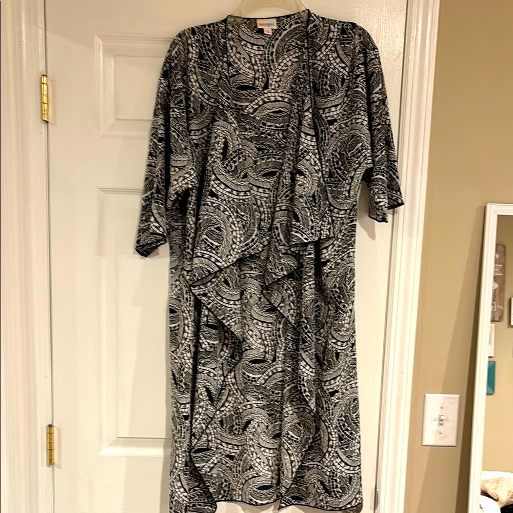 Lula Roe Patterned Long Cardigan. Measures 41-1/2” from back of neck to bottom.